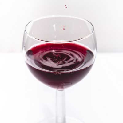 Clear Wine Glass With Red Liquid
